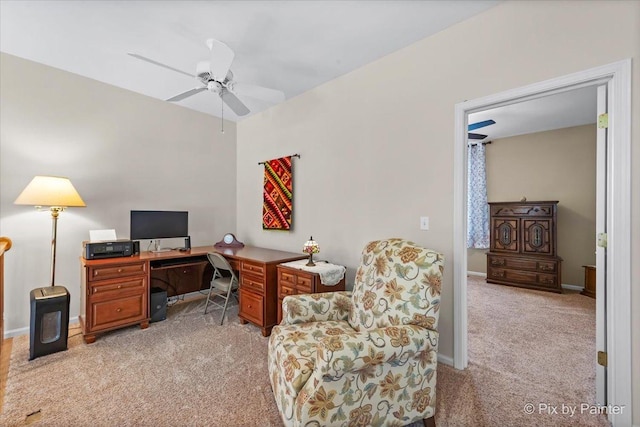 office with light carpet, ceiling fan, and baseboards