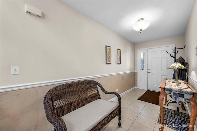 foyer with light tile patterned floors