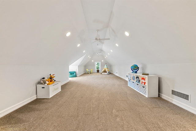 playroom with visible vents, baseboards, carpet, and vaulted ceiling