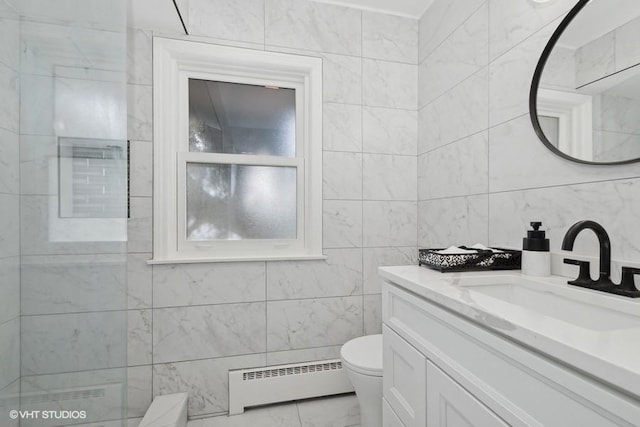 bathroom featuring marble finish floor, tile walls, toilet, baseboard heating, and vanity