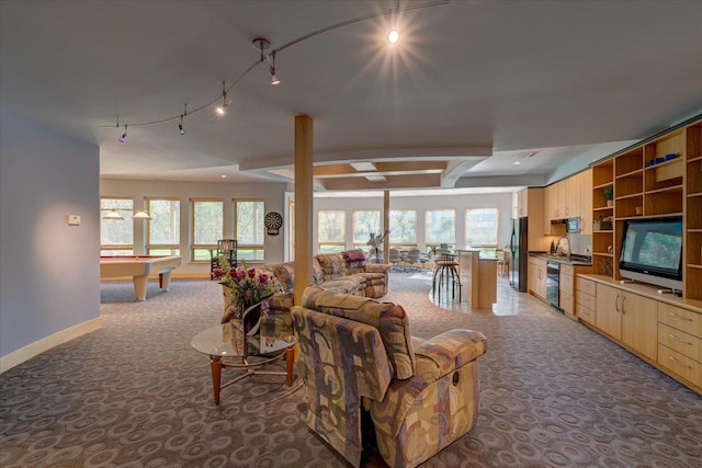 living room featuring light carpet, track lighting, billiards, and baseboards