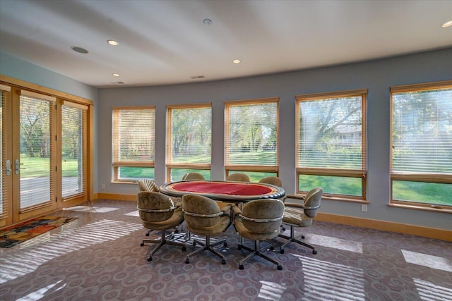 sunroom / solarium with visible vents and a wealth of natural light