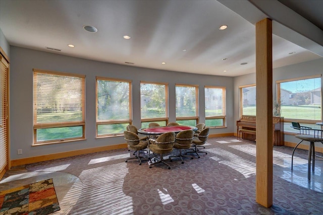 carpeted dining space featuring baseboards, visible vents, and recessed lighting