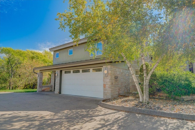 garage with driveway