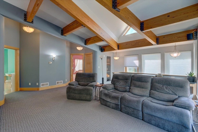 living area featuring baseboards, visible vents, beamed ceiling, and carpet flooring