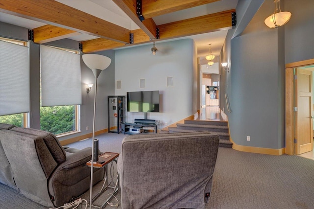 living room featuring beam ceiling, visible vents, stairway, light carpet, and baseboards