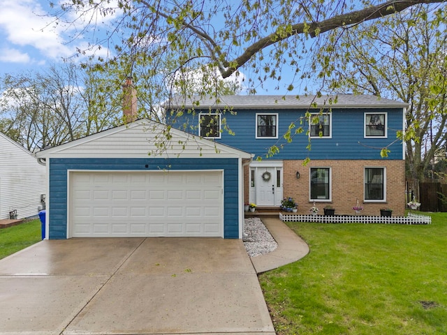 view of front of property with brick siding, a front yard, and a garage