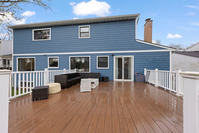 wooden deck featuring an outdoor hangout area