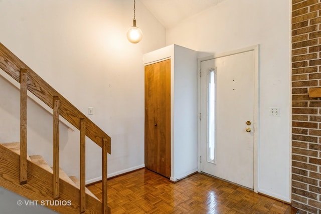 entryway featuring baseboards