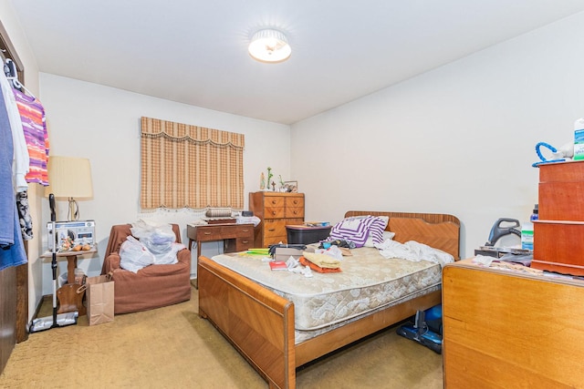 bedroom with light carpet