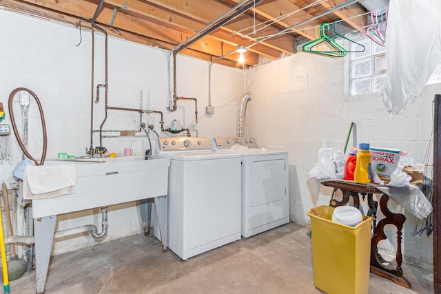 clothes washing area featuring laundry area and washer and dryer