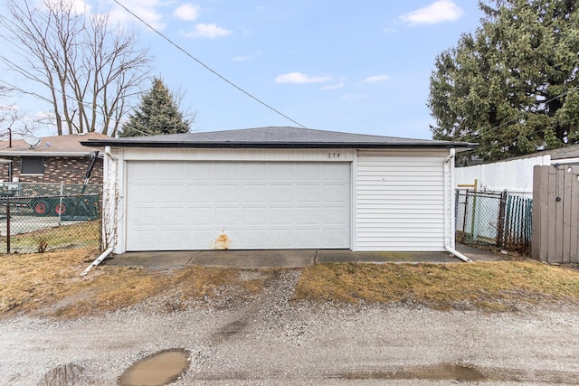 detached garage with fence