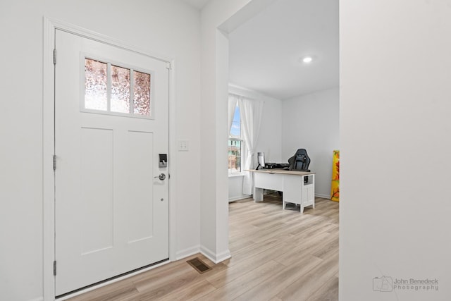 entrance foyer featuring light wood-type flooring, visible vents, baseboards, and recessed lighting