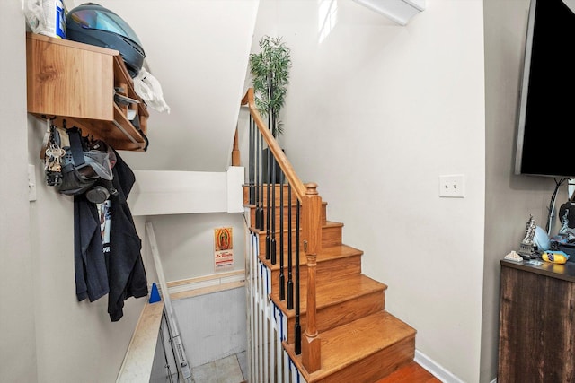 staircase with baseboards