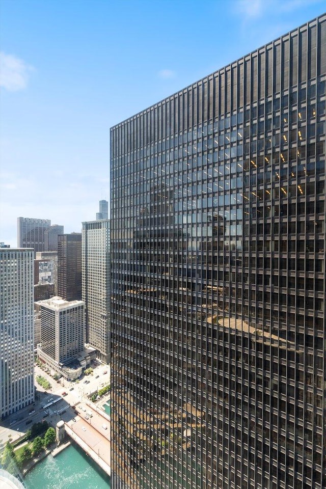 property's view of city featuring a water view