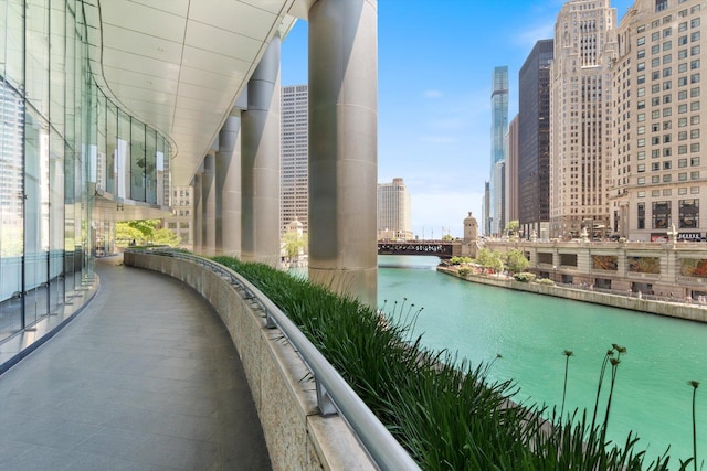 balcony with a city view and a water view