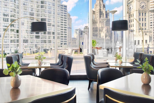 interior space featuring outdoor dining area and a city view