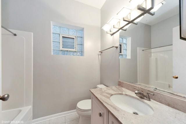 full bath featuring baseboards, toilet, tile patterned flooring, vanity, and shower / bathing tub combination