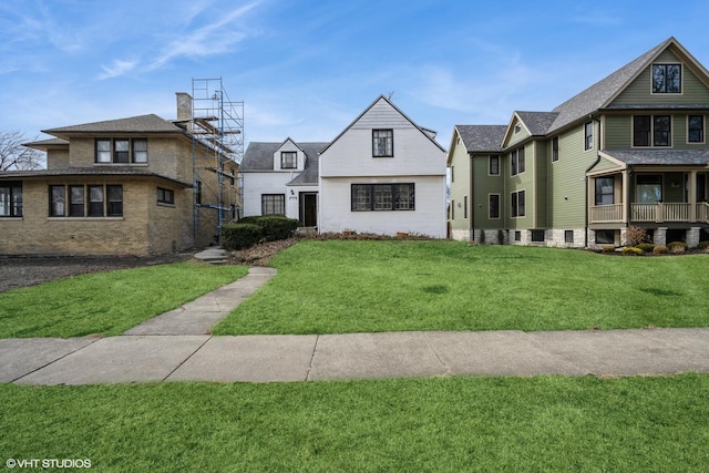 view of front of home with a front yard