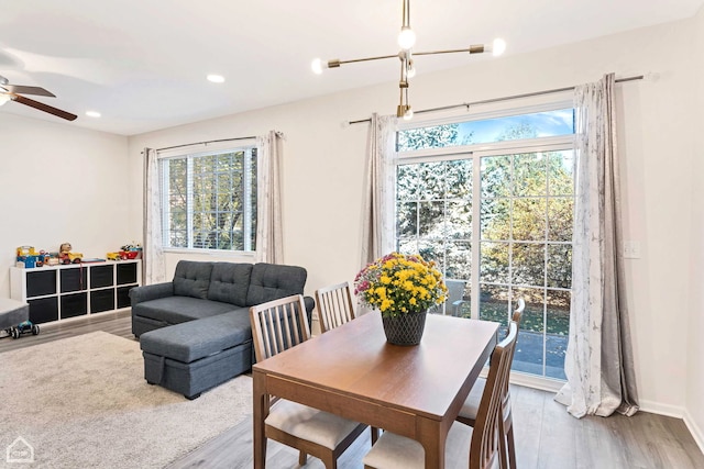 dining room featuring recessed lighting, baseboards, wood finished floors, and ceiling fan