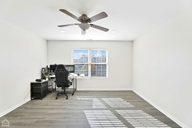 home office featuring recessed lighting, wood finished floors, baseboards, and ceiling fan