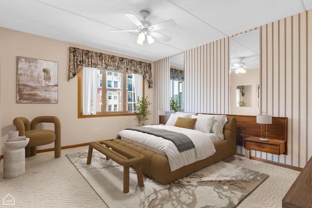 bedroom featuring ceiling fan, carpet floors, and baseboards