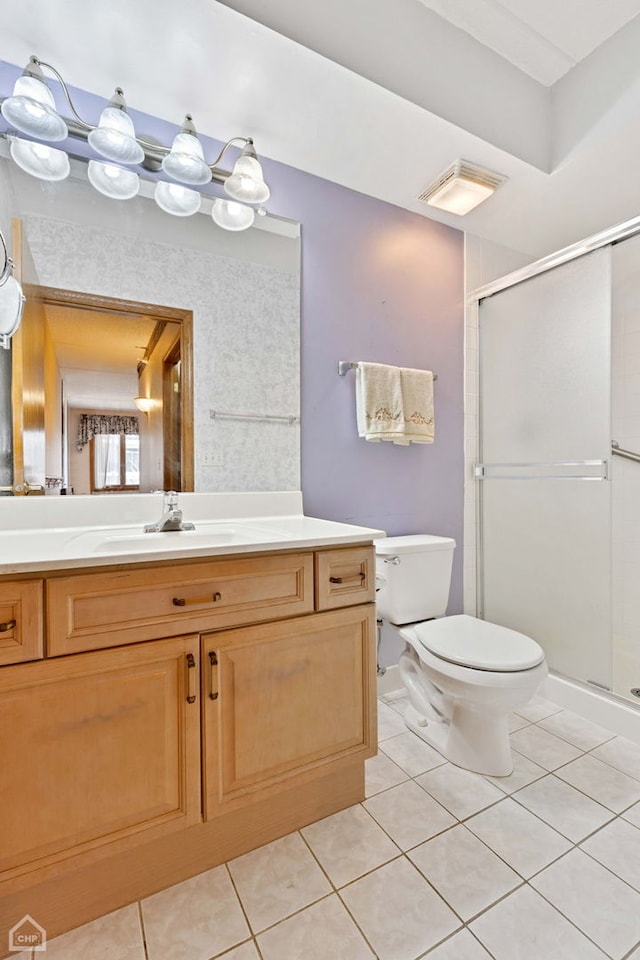 full bathroom with visible vents, a shower stall, toilet, and tile patterned floors