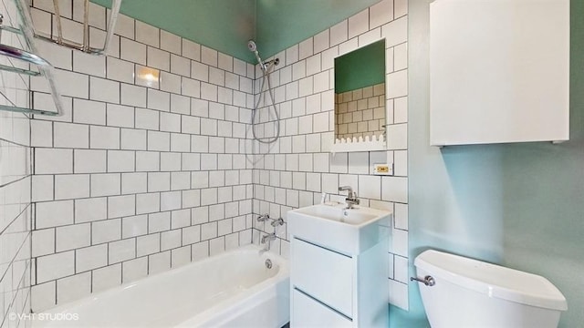 bathroom featuring shower / bath combination, vanity, and toilet