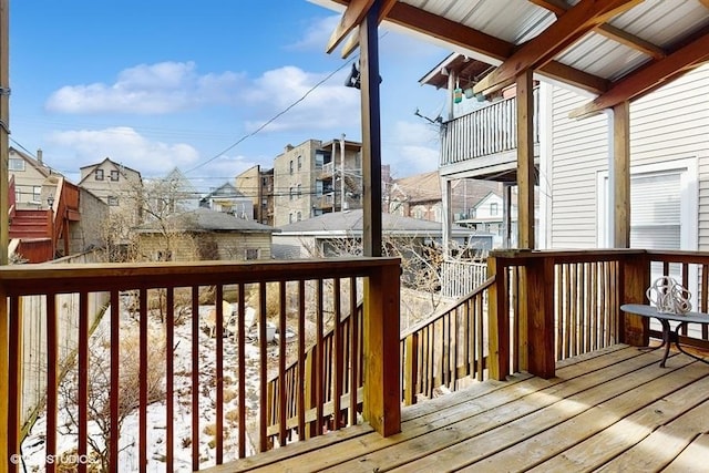 wooden deck featuring a residential view