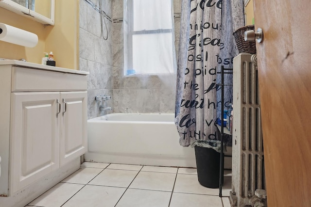 full bath with tile patterned flooring, radiator heating unit, shower / bathtub combination with curtain, and vanity