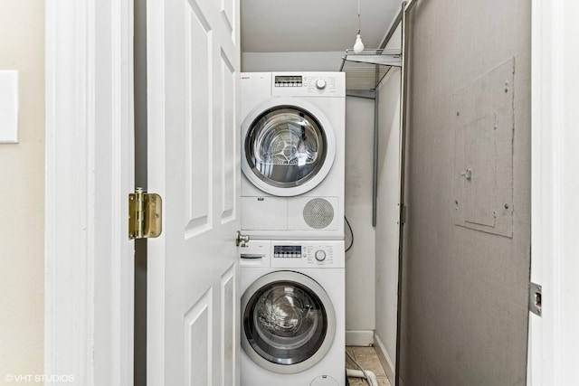 washroom with laundry area and stacked washer and clothes dryer