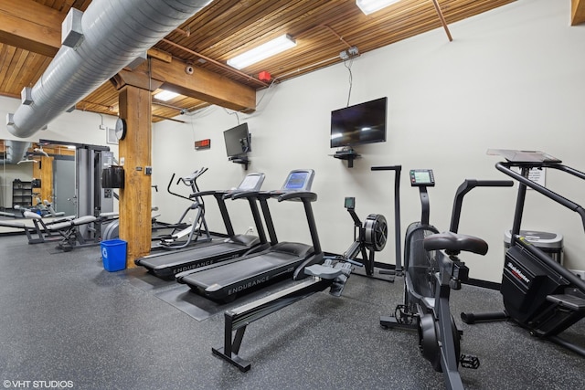 gym featuring baseboards