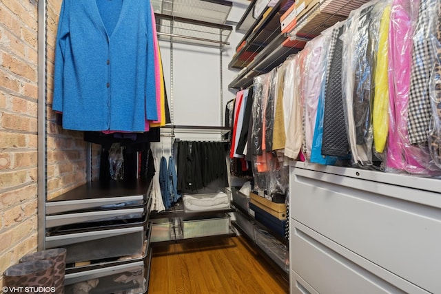 spacious closet featuring wood finished floors