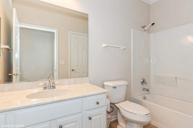 bathroom featuring vanity, shower / tub combination, and toilet