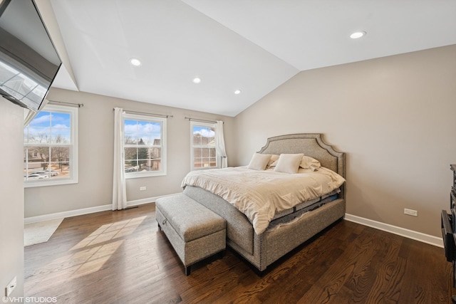 bedroom featuring lofted ceiling, dark wood-type flooring, recessed lighting, and baseboards