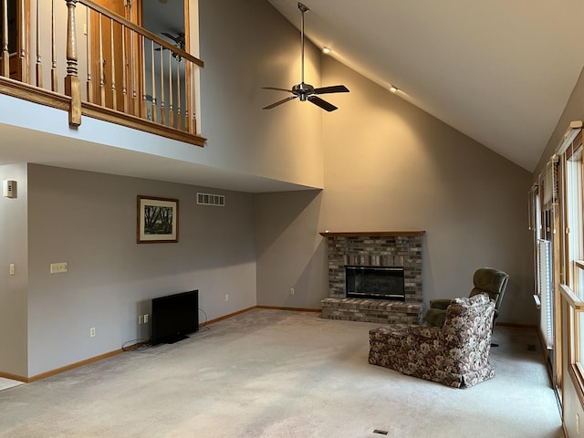 unfurnished living room featuring visible vents, a brick fireplace, baseboards, and carpet