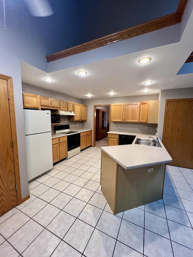 kitchen with a peninsula, freestanding refrigerator, a sink, electric stove, and under cabinet range hood