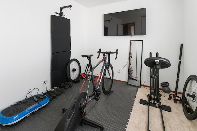 exercise area with baseboards