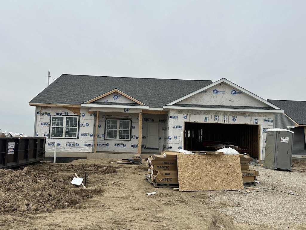643 S Regulators St, Rochelle, IL 61068 - property in mid-construction with a garage and roof with shingles