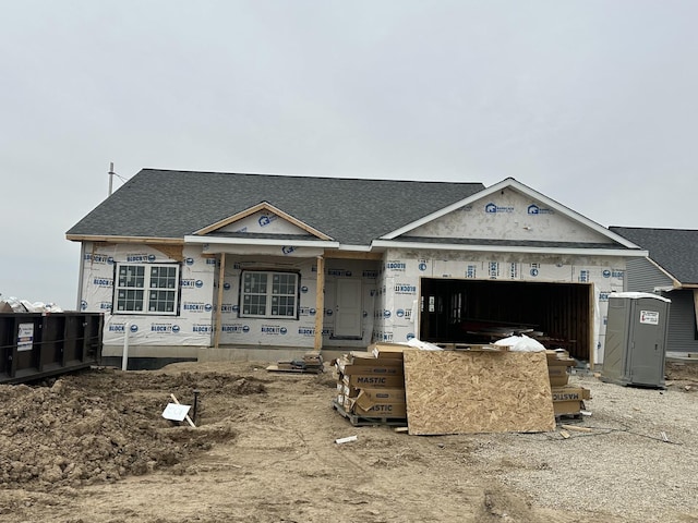 643 S Regulators St, Rochelle, IL 61068 - property in mid-construction with a garage and roof with shingles