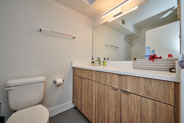 full bath featuring visible vents, toilet, vanity, tile patterned flooring, and baseboards