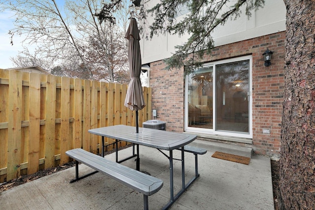 view of patio with fence