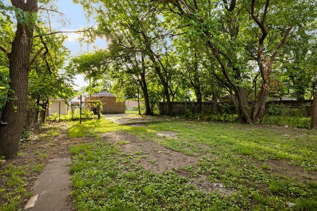 view of yard with fence