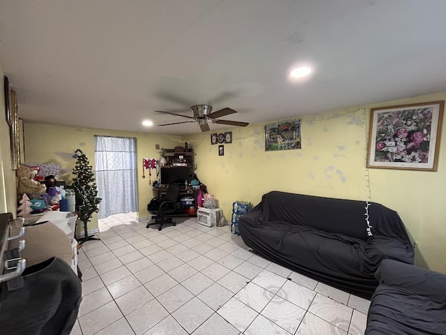 living room with recessed lighting, a ceiling fan, and light tile patterned floors