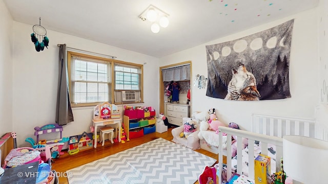 1222 Austin St, Evanston, IL 60202 - bedroom featuring wood finished floors and cooling unit