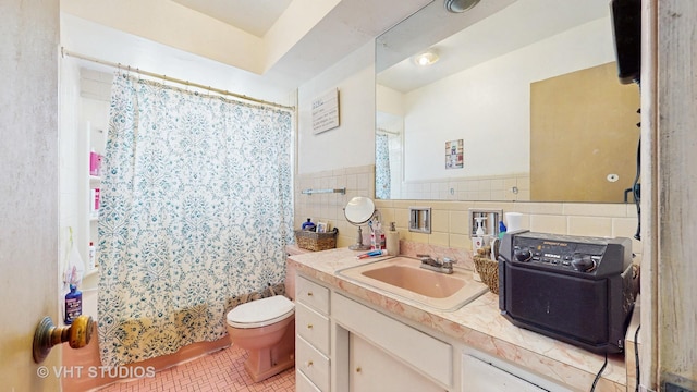 1222 Austin St, Evanston, IL 60202 - bathroom with tile walls, tile patterned floors, toilet, vanity, and shower / bath combination with curtain