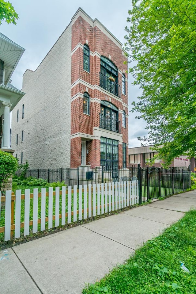 view of property featuring a fenced front yard