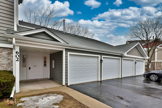 view of property exterior featuring roof with shingles