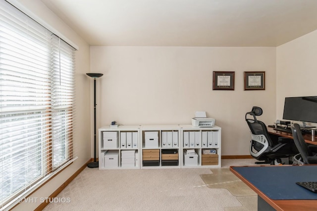 carpeted office with baseboards