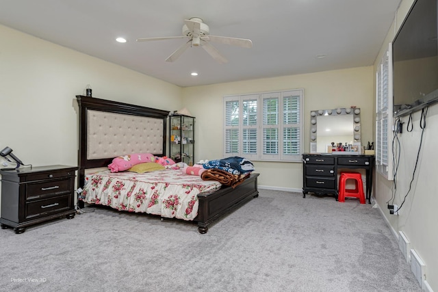 bedroom featuring baseboards, recessed lighting, a ceiling fan, and light colored carpet